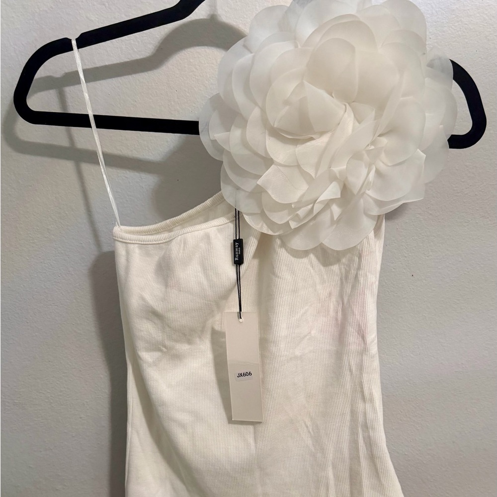 Elegant White Blouse with Floral Accent